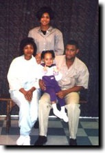 Ronald Burkes, prisoner of the drug war, with his family